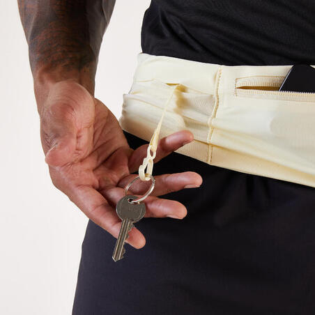 Пояс для бігу Kiprun Basique 2 для смартфону жовтий