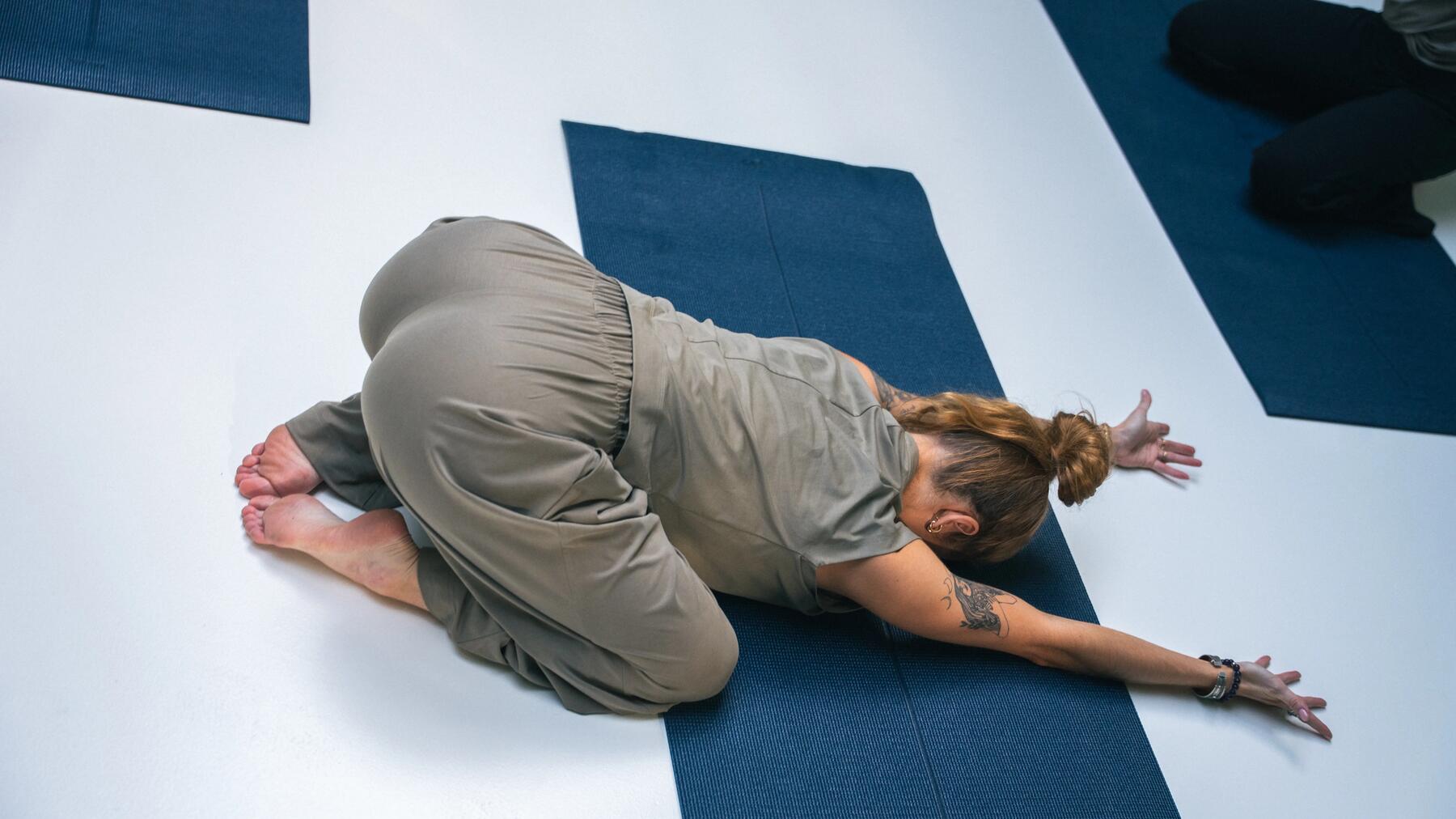 Person adding weights to ankle weight accessories