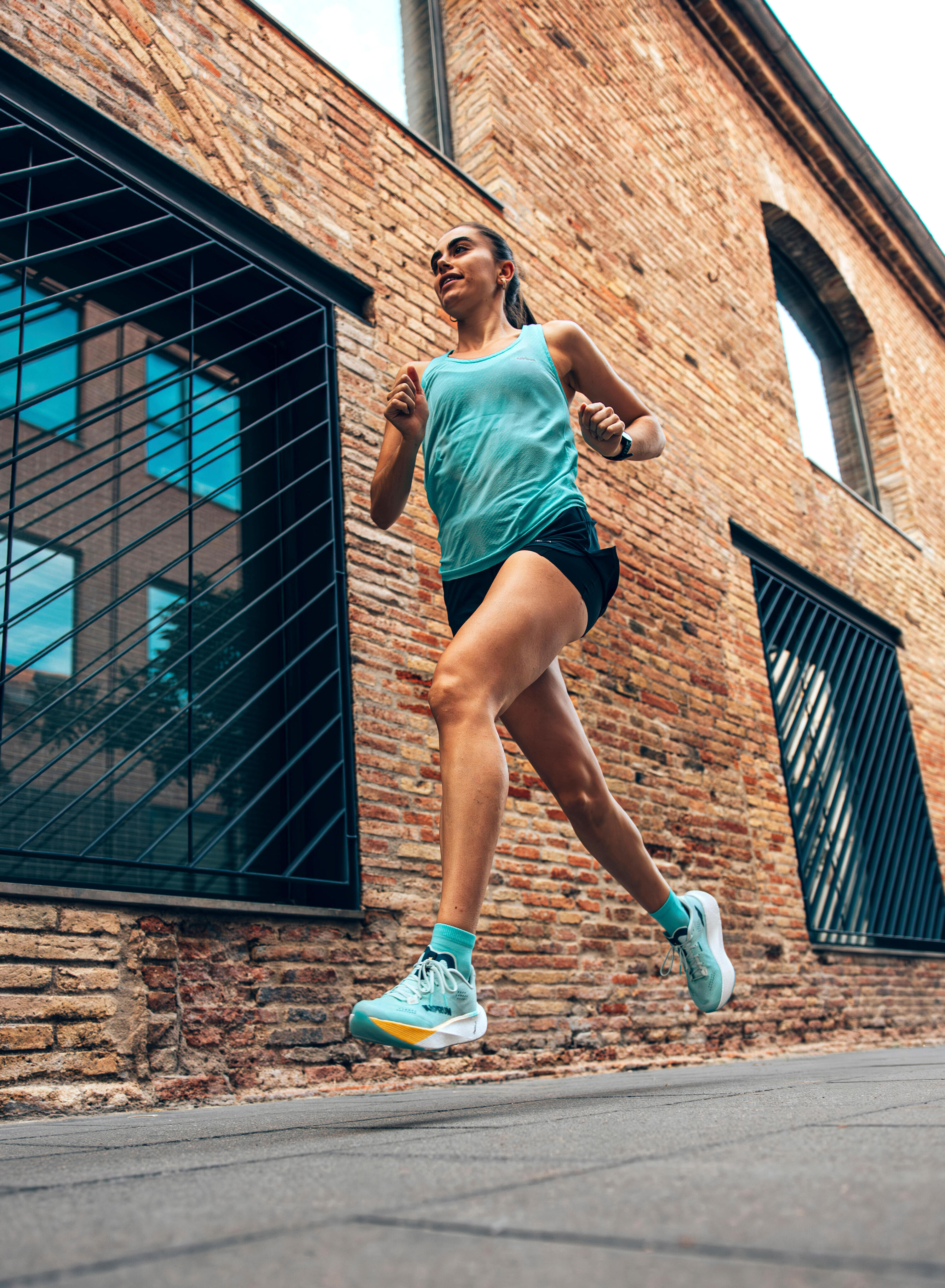 Short de course 2 en 1 femme, Run 500 Confort 10/10