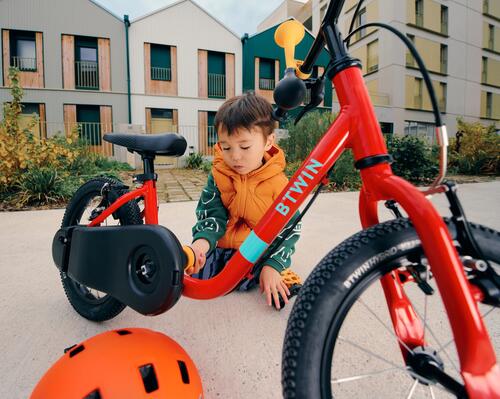adjusting a child's helmet