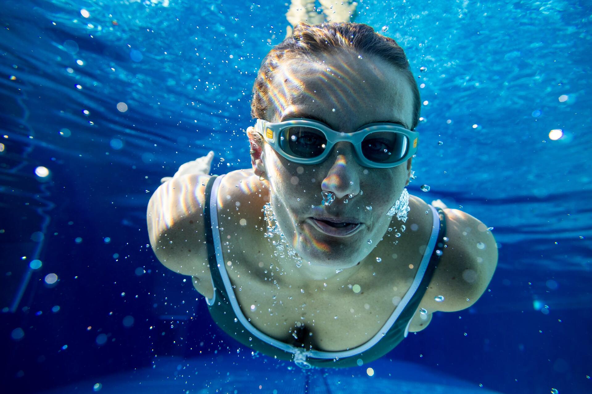 Man swimming in a pool
