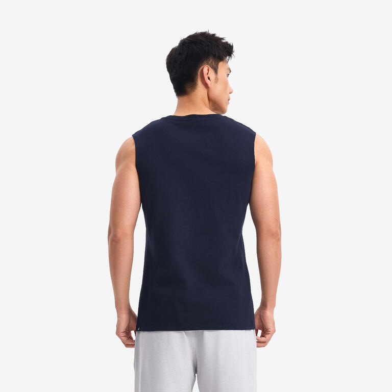 Man wearing a navy sleeveless gym tank top shown from the back