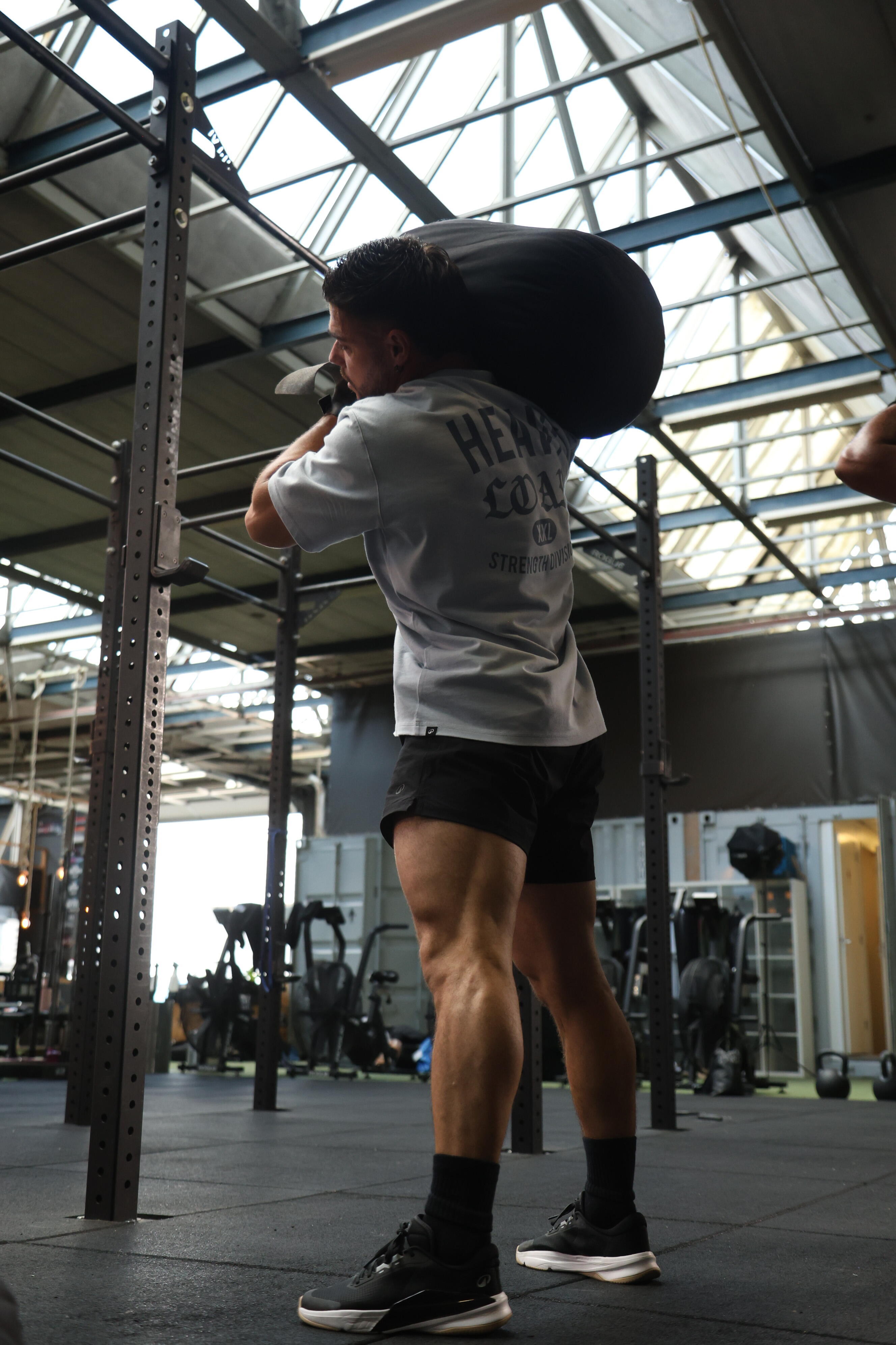 Short d’entraînement extensible homme 11/13