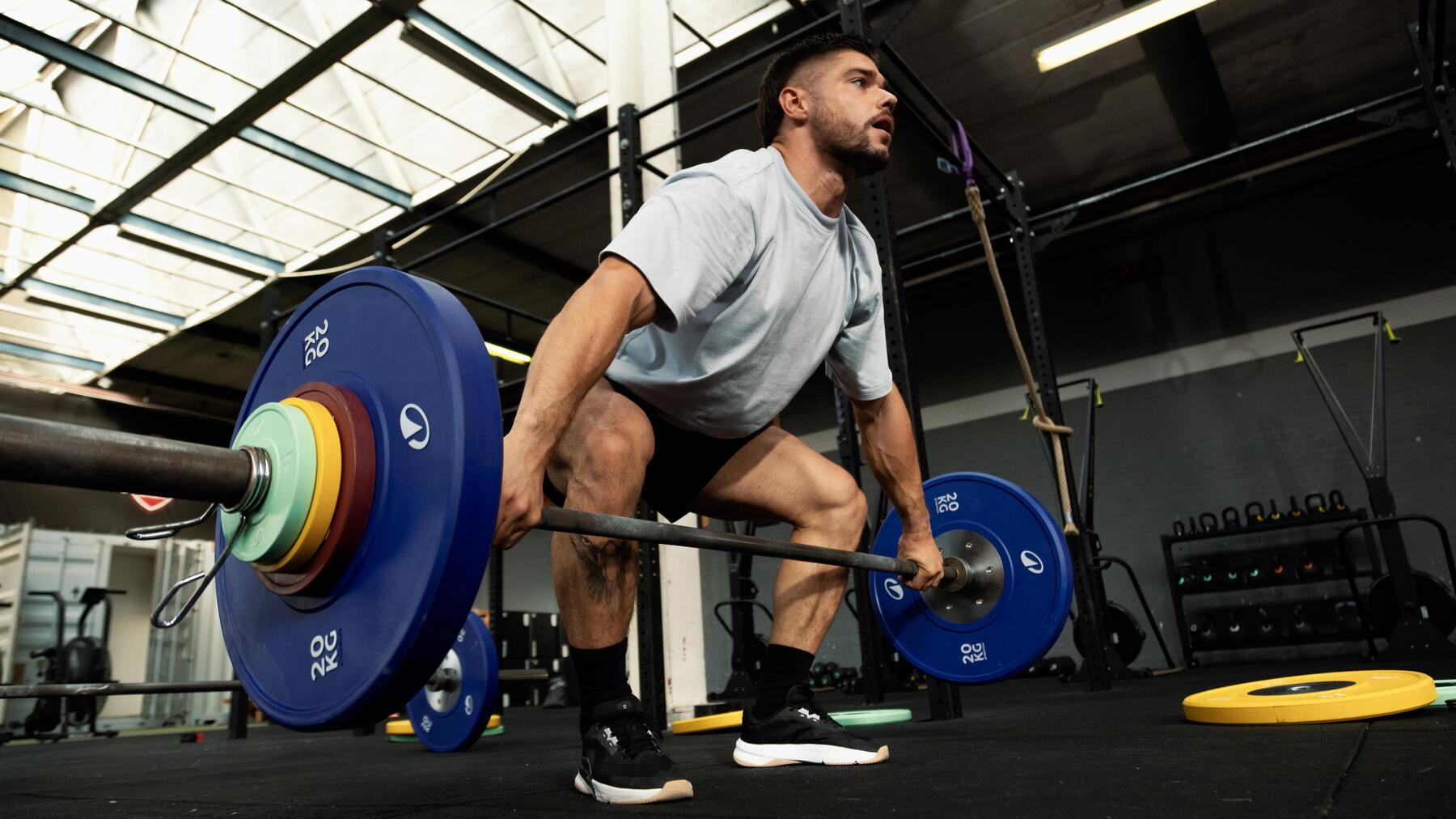 pareja haciendo arrancada en crossfit