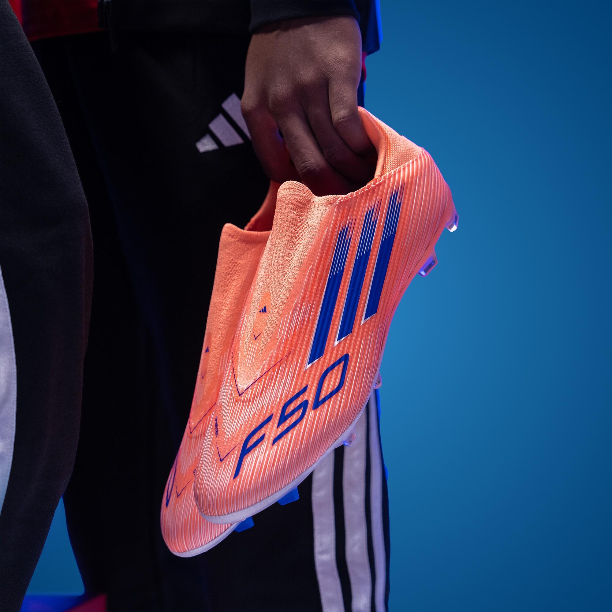 F50 League Laceless FG/MG Boots Orange Adult | Decathlon