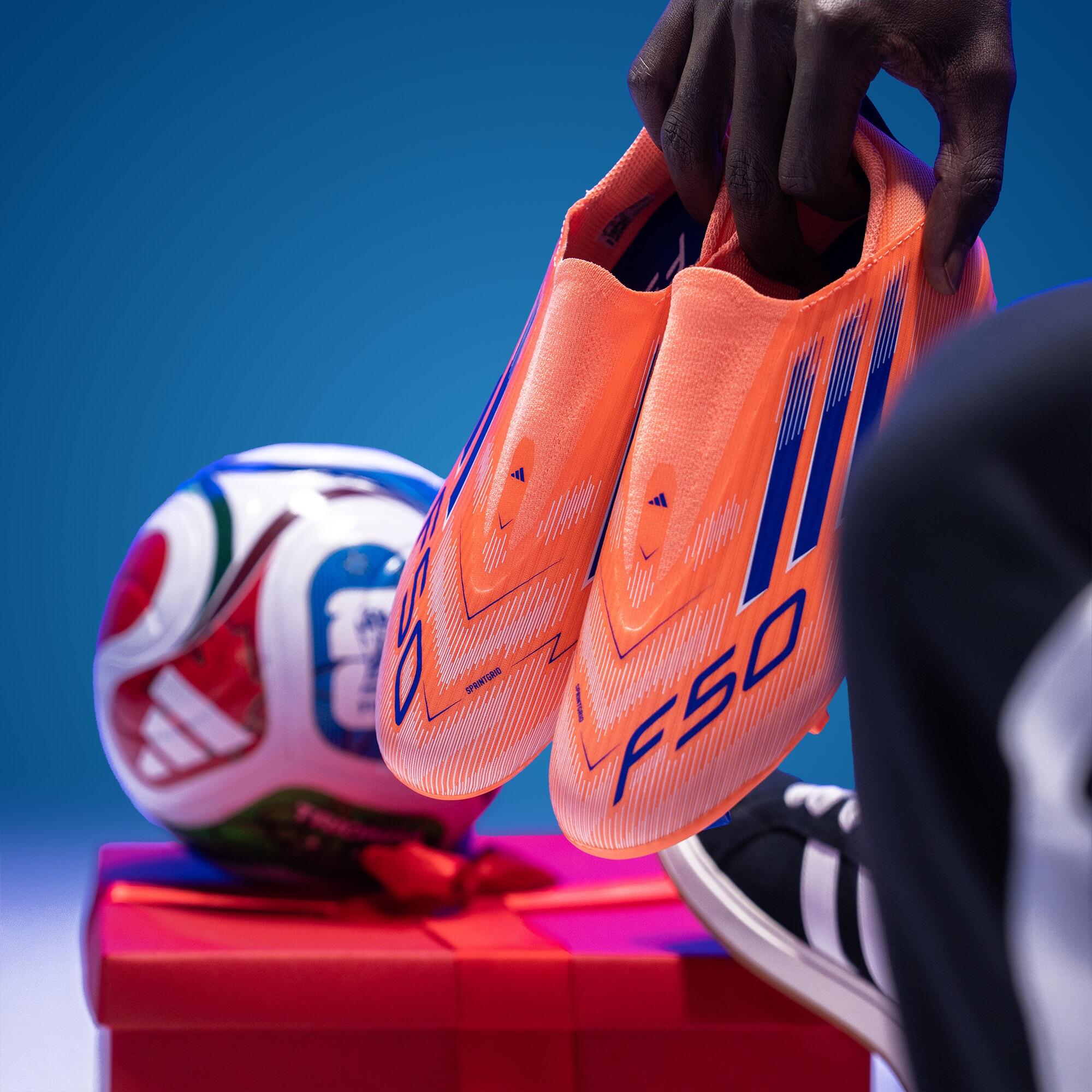 F50 League Laceless FG/MG Boots Orange Adult - Decathlon