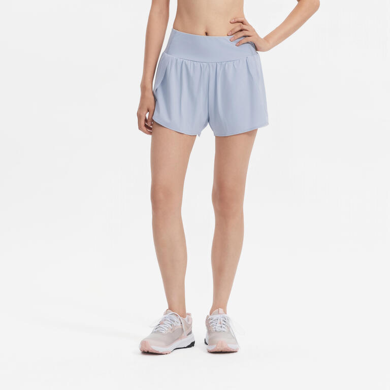 Foggy blue women's 2-in-1 training shorts with fitted inner shorts and side split outer layer