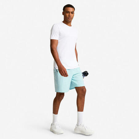 Шорти чоловічі для фітнесу з кишенями на блискавці світло-сині