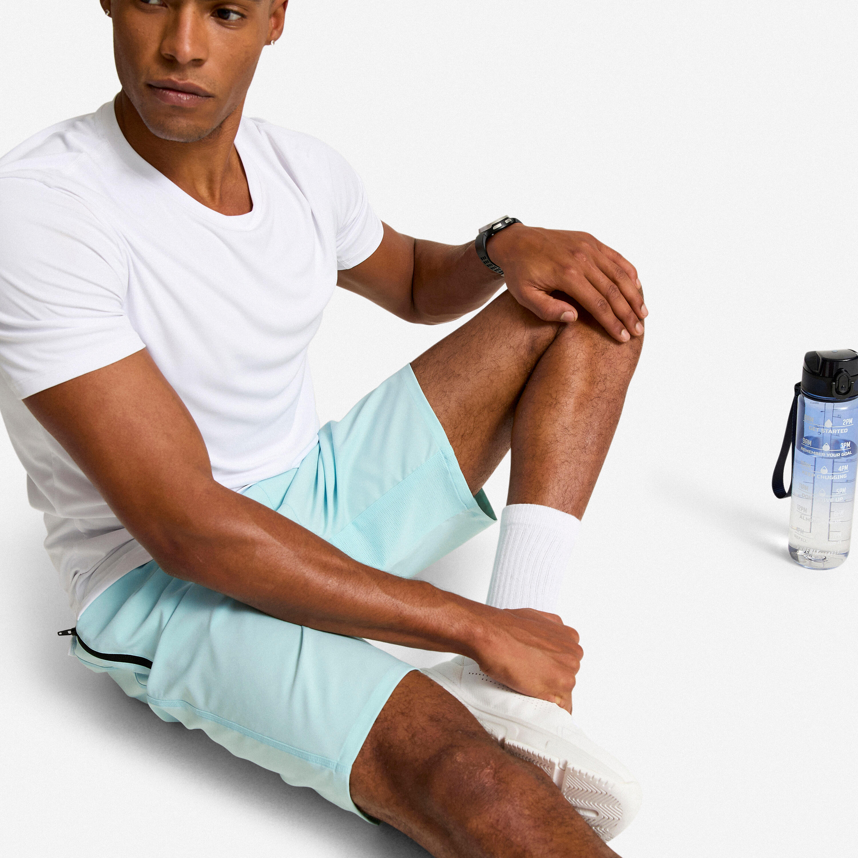 Short de sport respirant avec poches zippées homme - DOMYOS