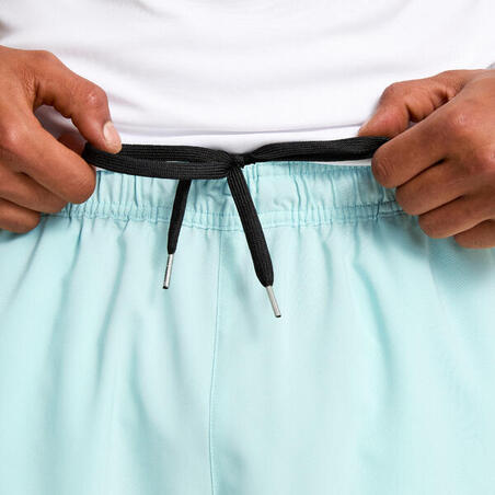 Шорти чоловічі для фітнесу з кишенями на блискавці світло-сині