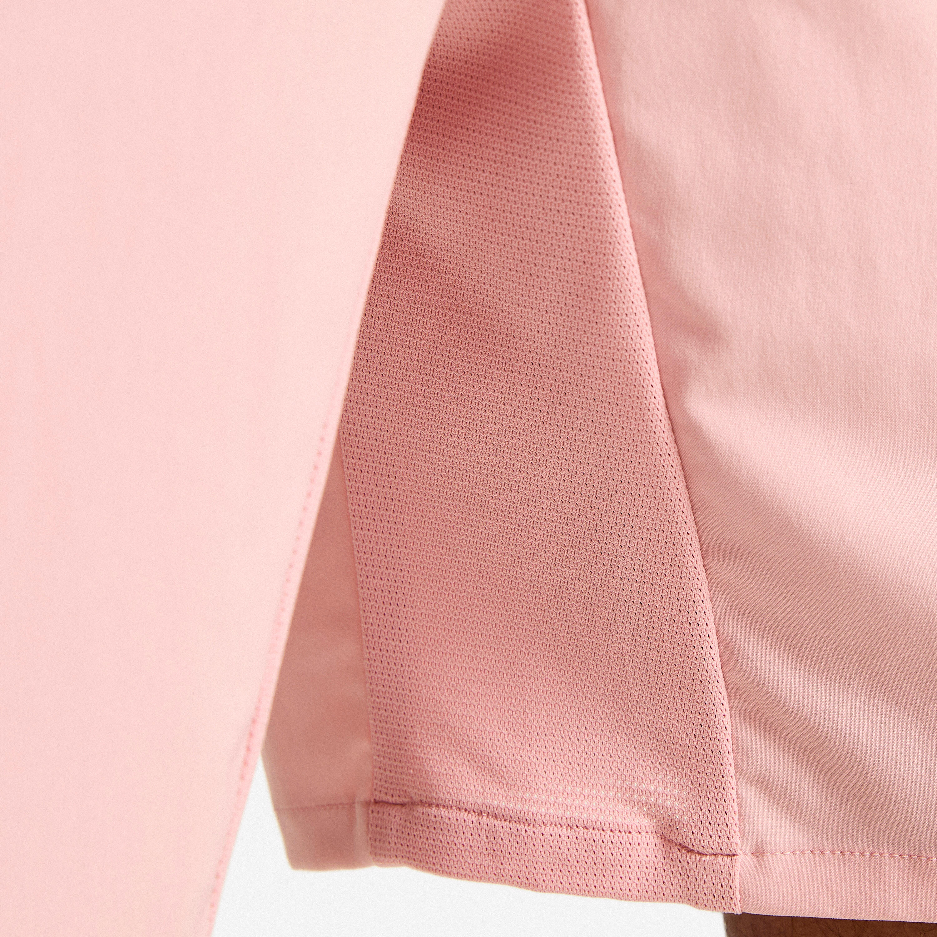 Short de sport respirant avec poches zippées homme 6/8