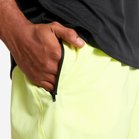 Шорти чоловічі для фітнесу з кишенями на блискавці неоново-жовті