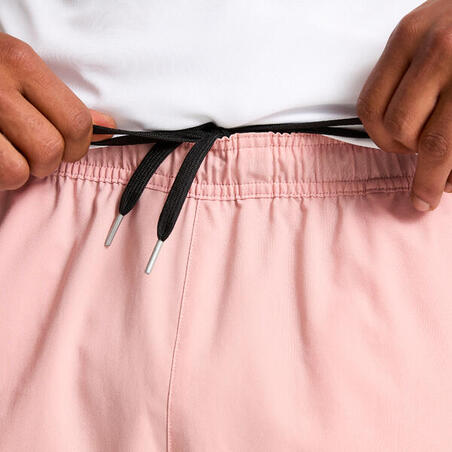 Шорти чоловічі для фітнесу з кишенями на блискавці світло-рожеві