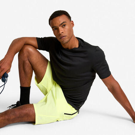 Шорти чоловічі для фітнесу з кишенями на блискавці неоново-жовті