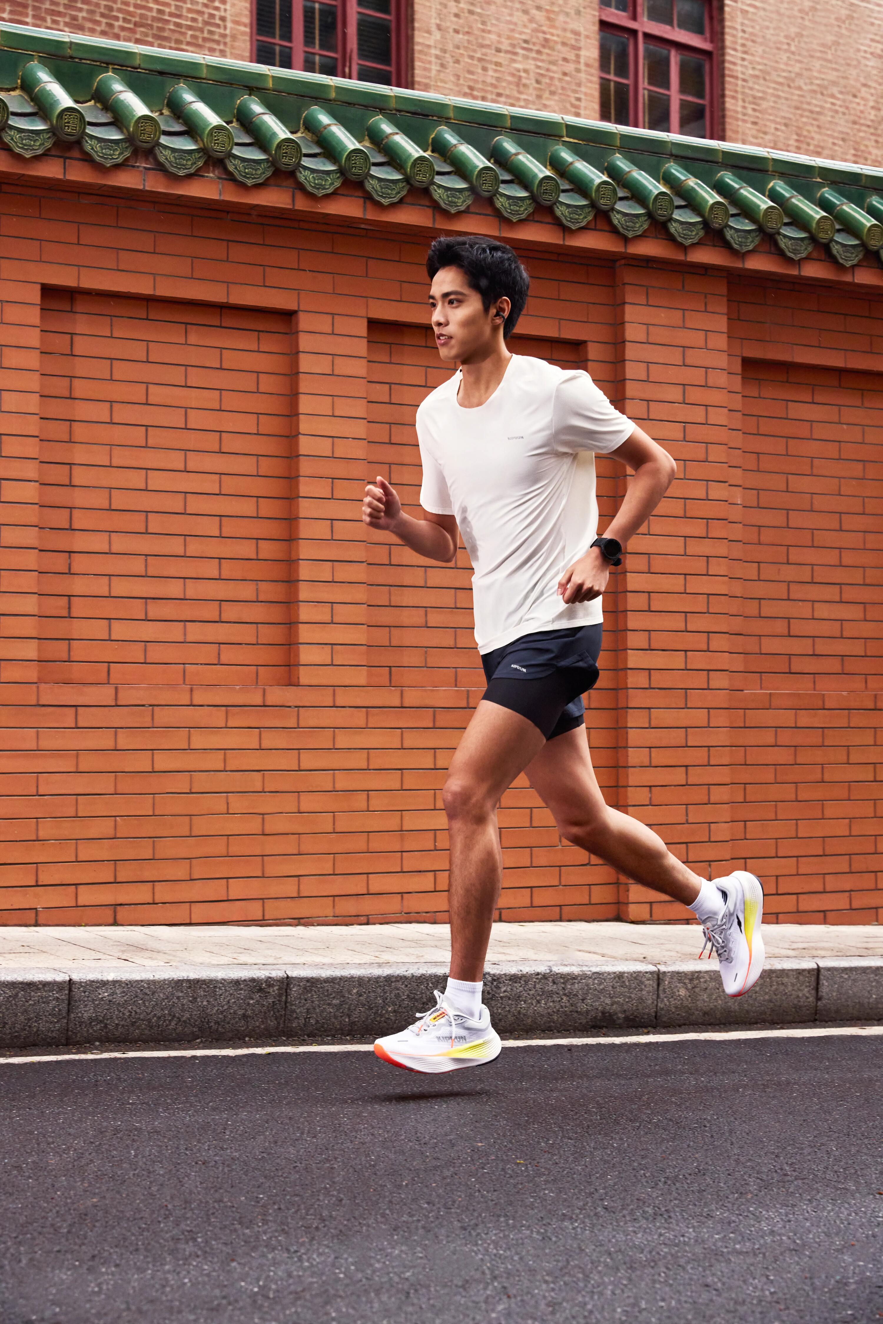 Men's road running shoes, Kiprun Kipride Max grey and orange 3/16