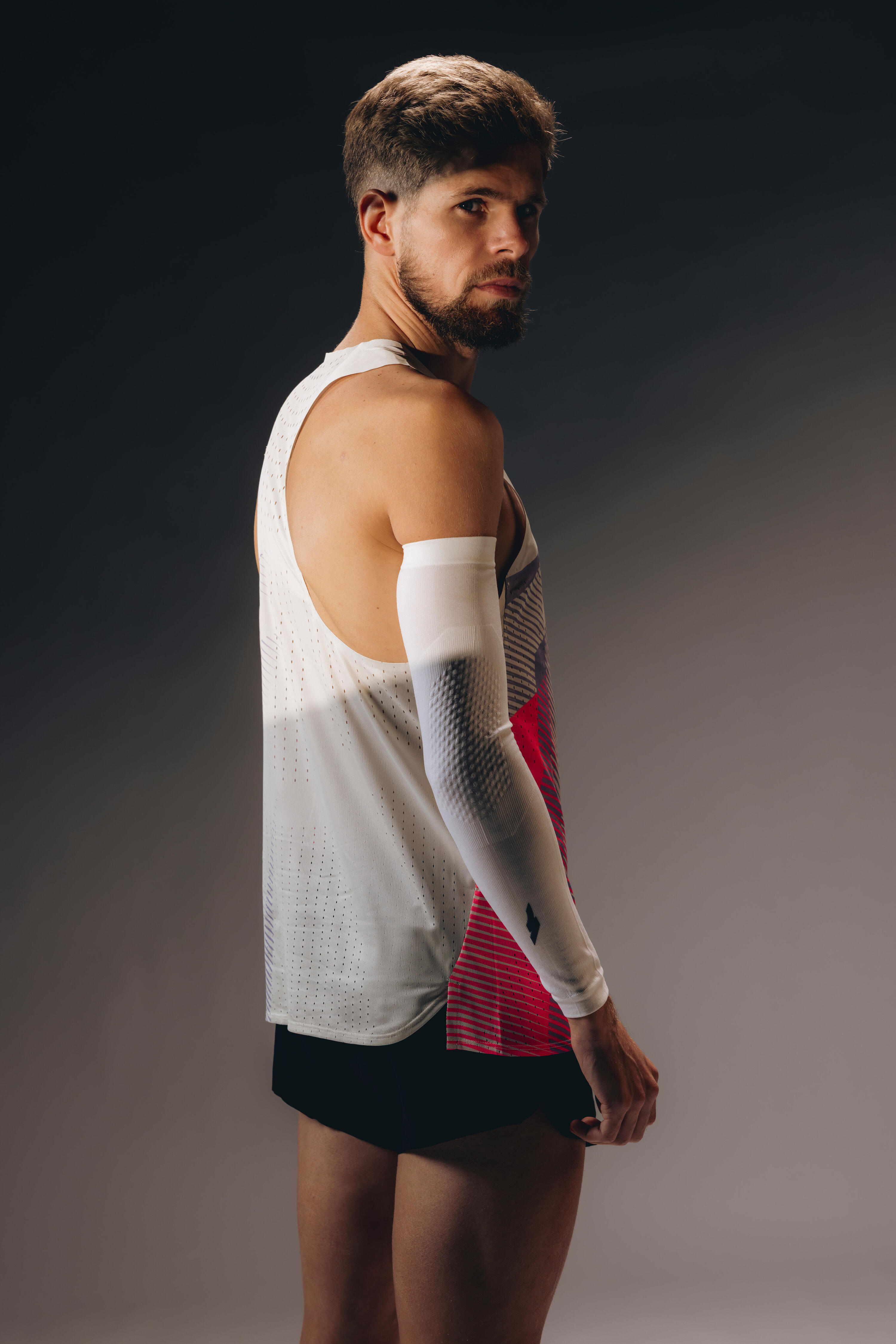 Lauf-Tanktop für Männer, Kiprun Proteam beige rosa 9/13