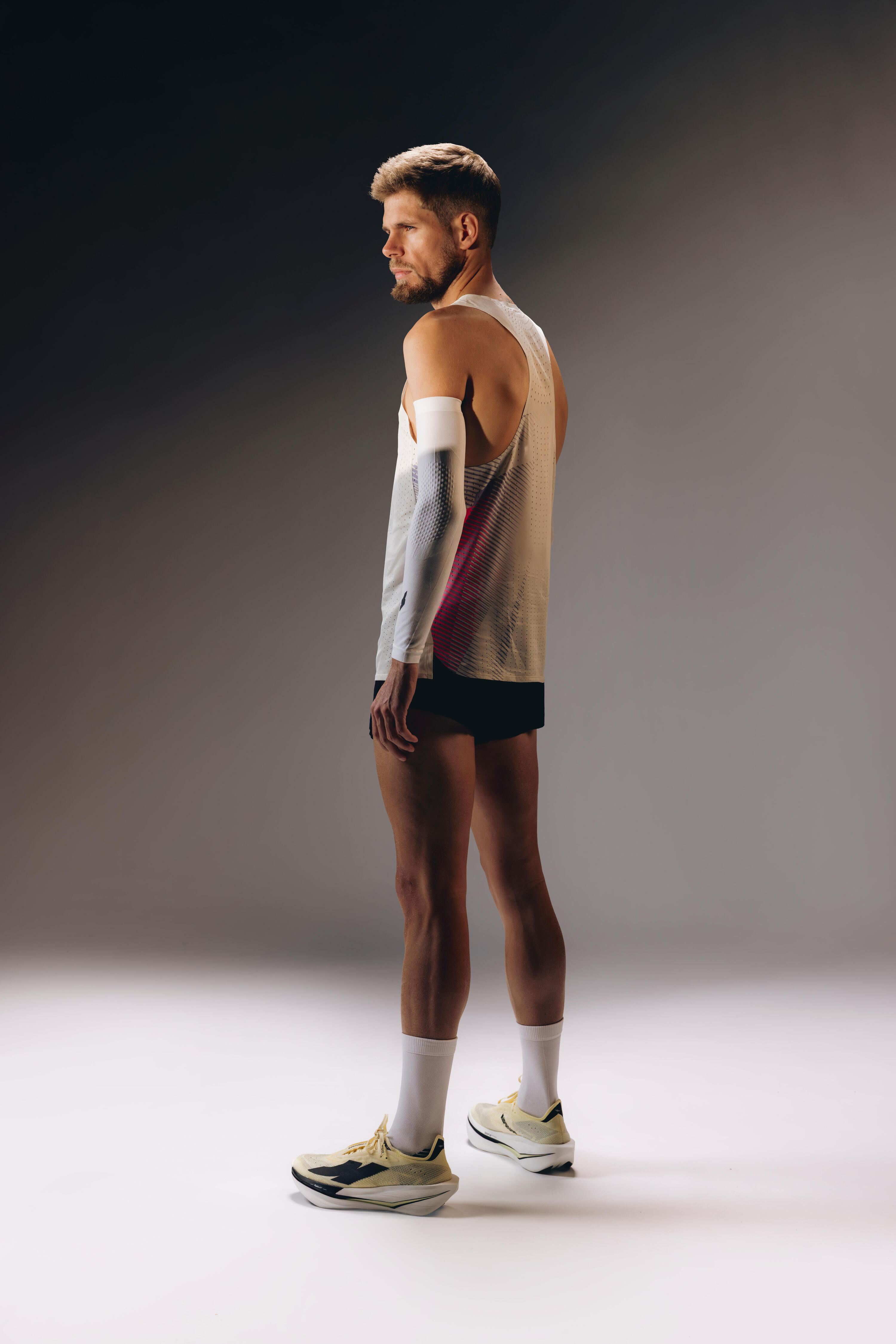 Lauf-Tanktop für Männer, Kiprun Proteam beige rosa 10/13