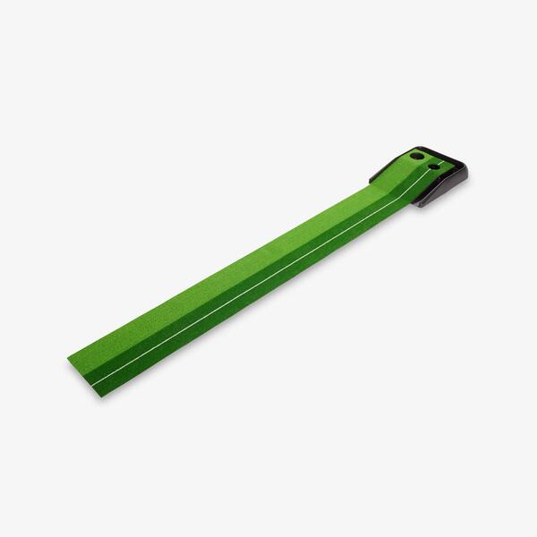 Green indoor putting mat with a ball return