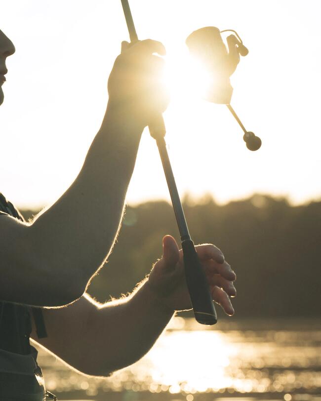Angler casting his line.