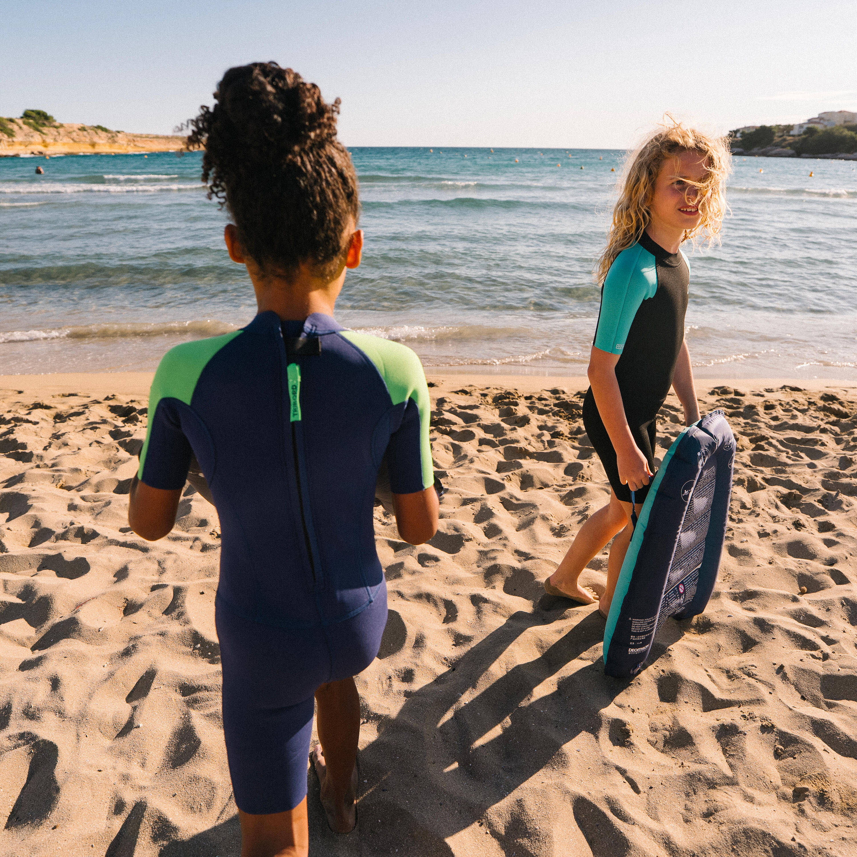 Kids’ surfing shorty suit 1.5 mm yulex 100 black turquoise -  2