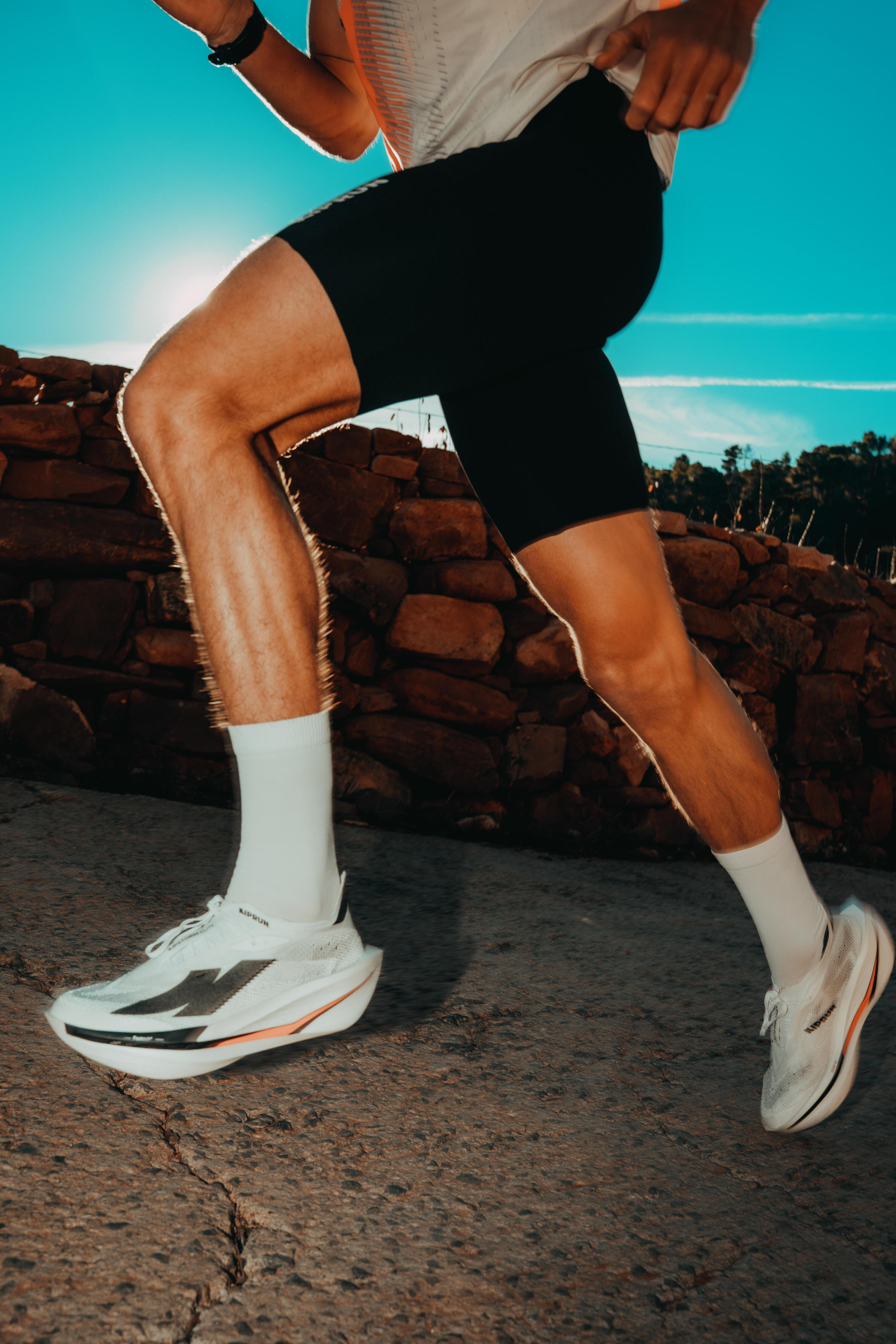 Scarpe running uomo KIPSTORM ELITE con piastra in carbonio bianco-rosa 10/14
