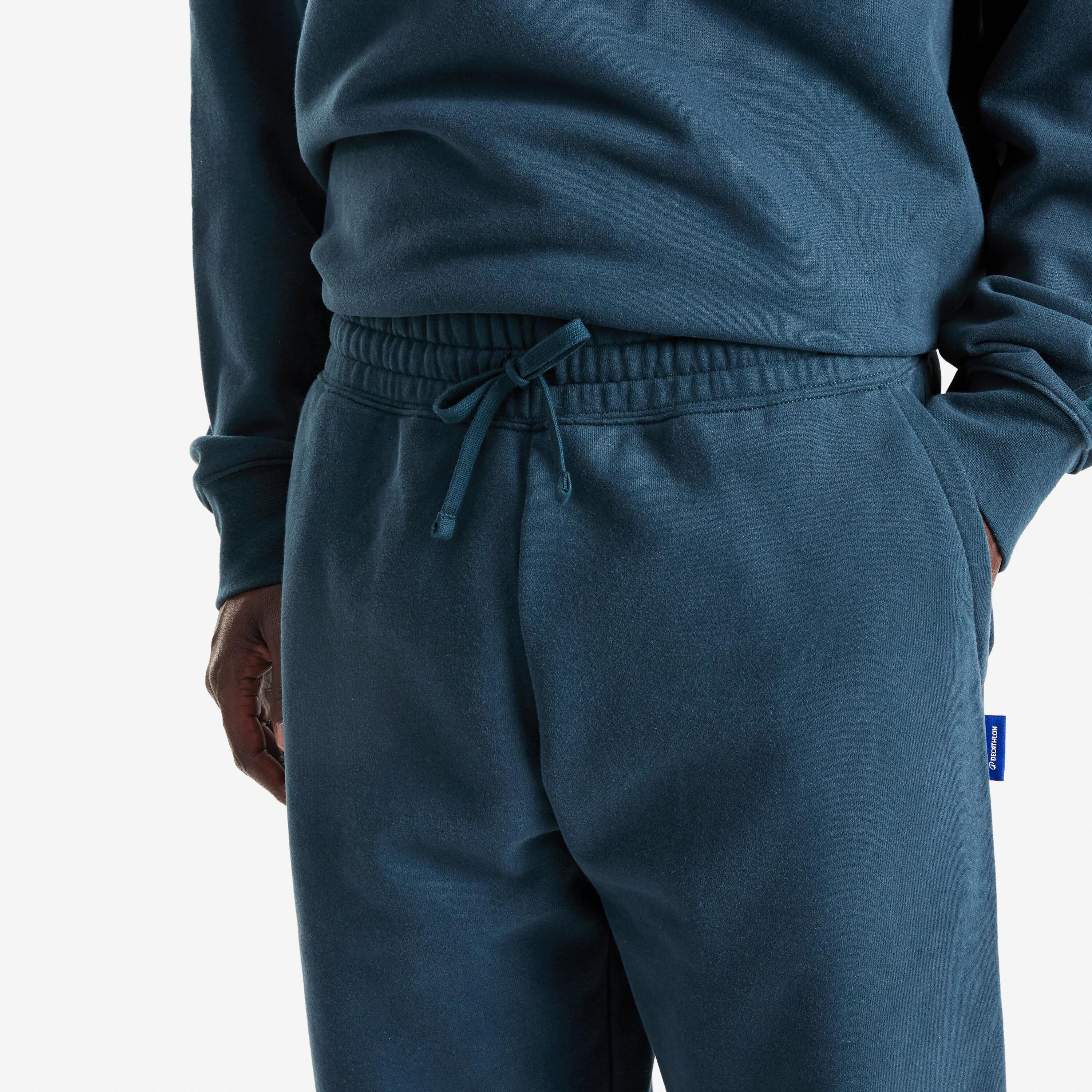 Pantalons Xandall Elementals Home Verd Fosc Oversize 2/3