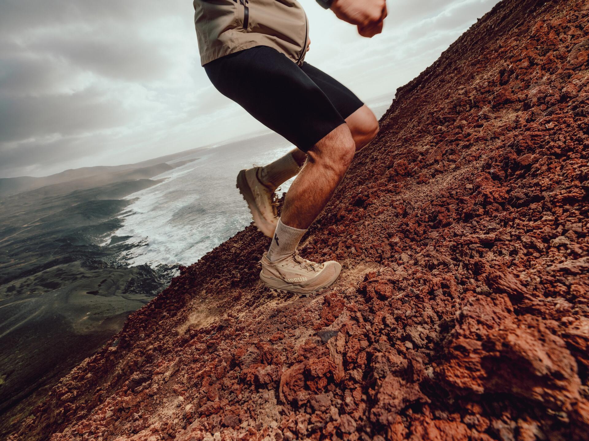 Man and woman trail running
