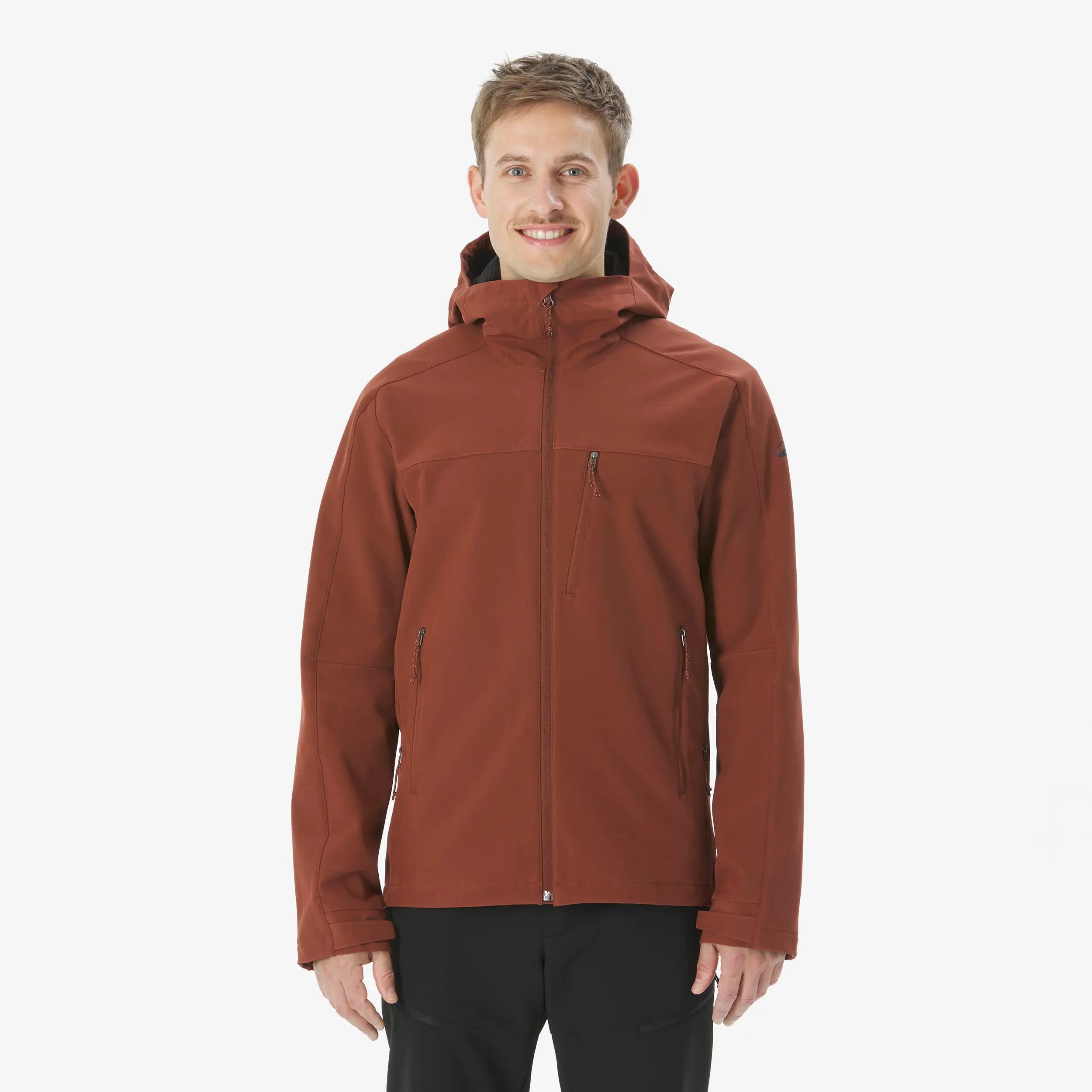 Men Trekking Warm Windproof Softshell Jacket With Hoodie - MT500 Red -  1