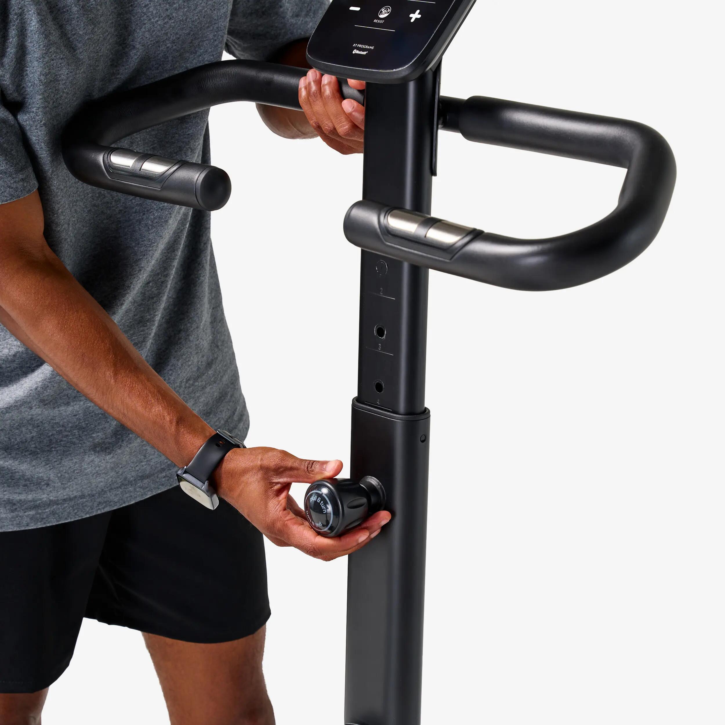 Vélo d'appartement avec résistance motorisée, EB520 B, garanti par Decathlon 8/14