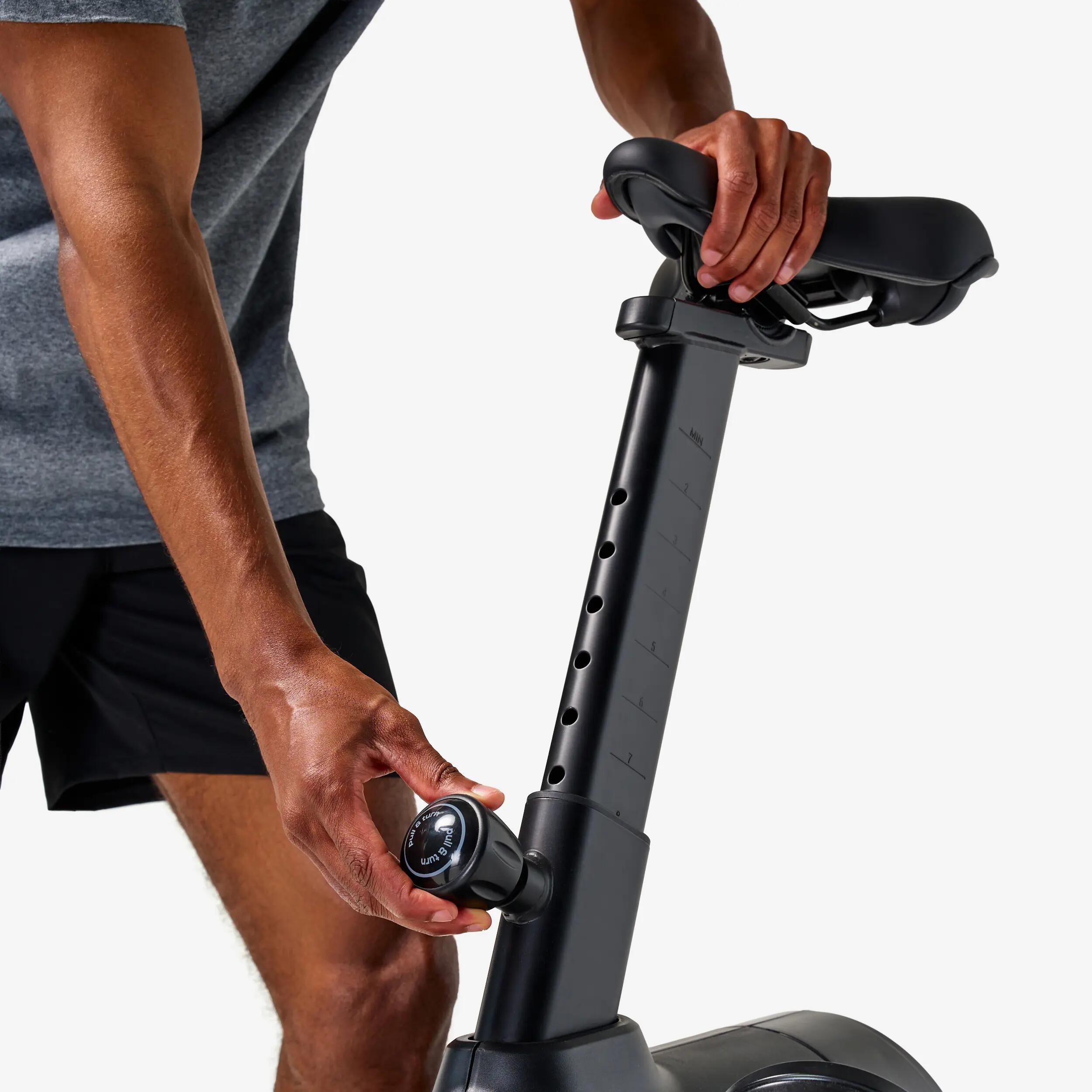 Vélo d'appartement avec résistance motorisée, EB520 B, garanti par Decathlon 9/14