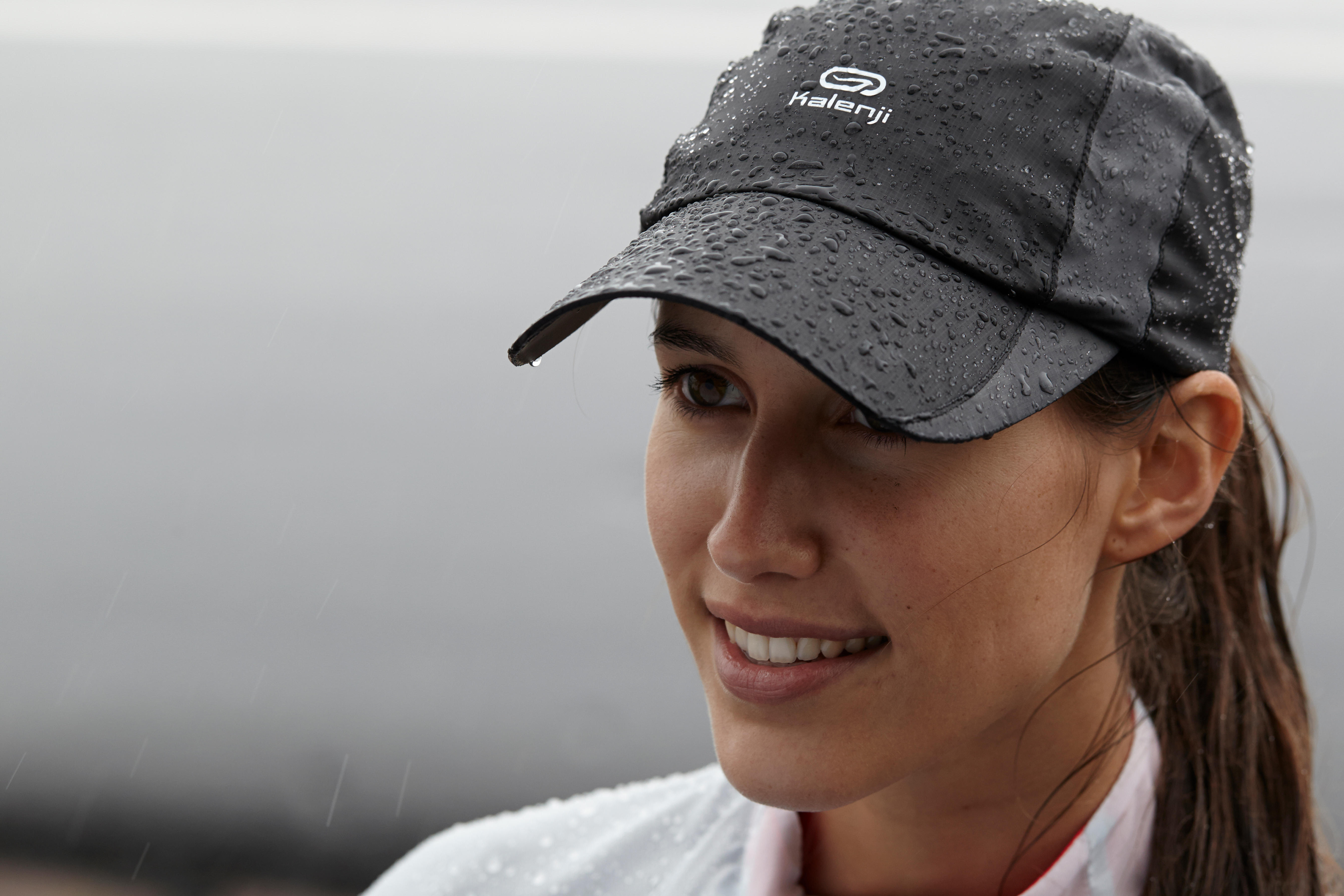 RUNNING RAIN CAP BLACK ADJUSTABLE 55-63 