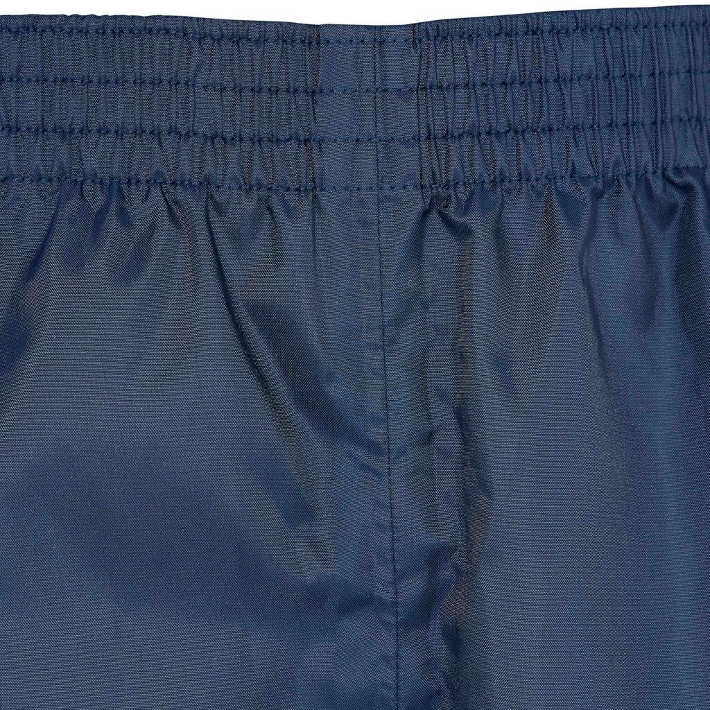 Cubrepantalón de senderismo impermeable azul para niños de 7 a 15 años MH100 TW