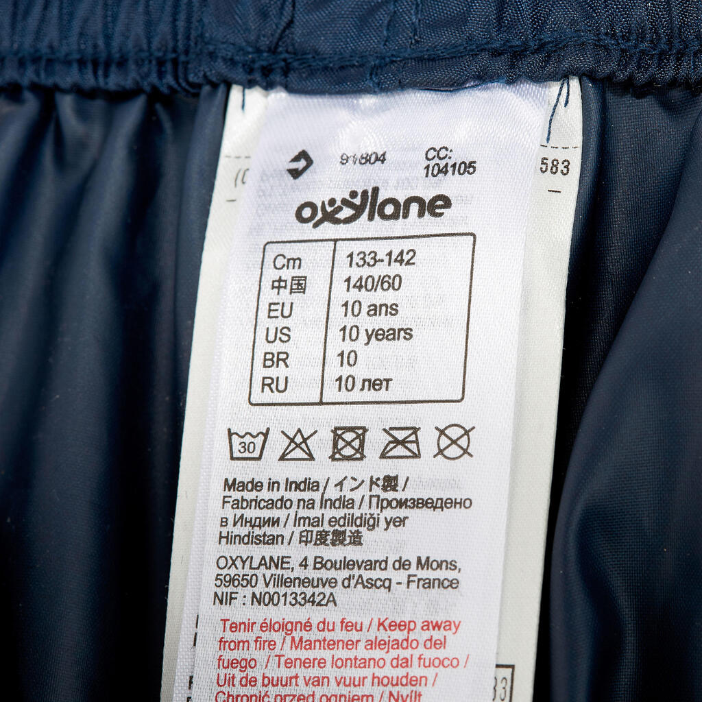 Surpantalon imperméable de randonnée enfant Hike 100 Marine