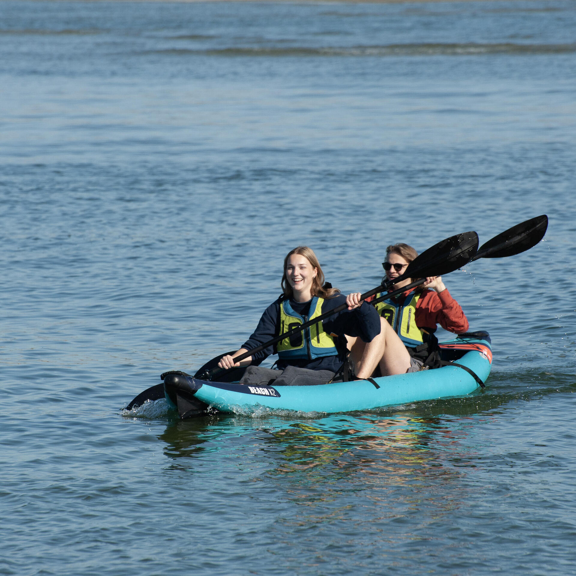 woman and man in a tandem kayak