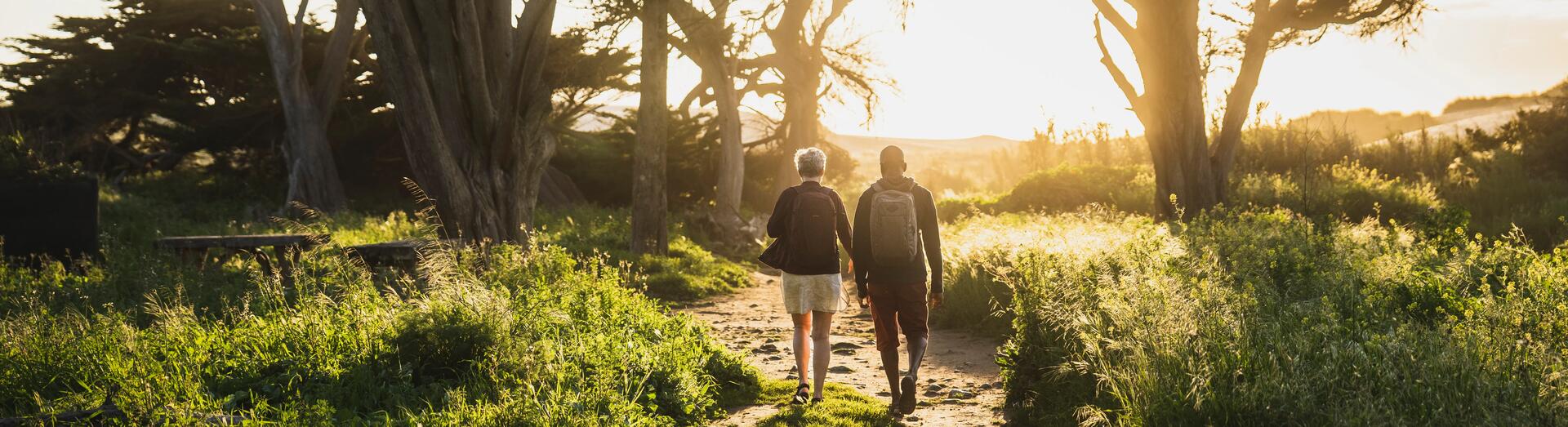 two people taking a walk in nature