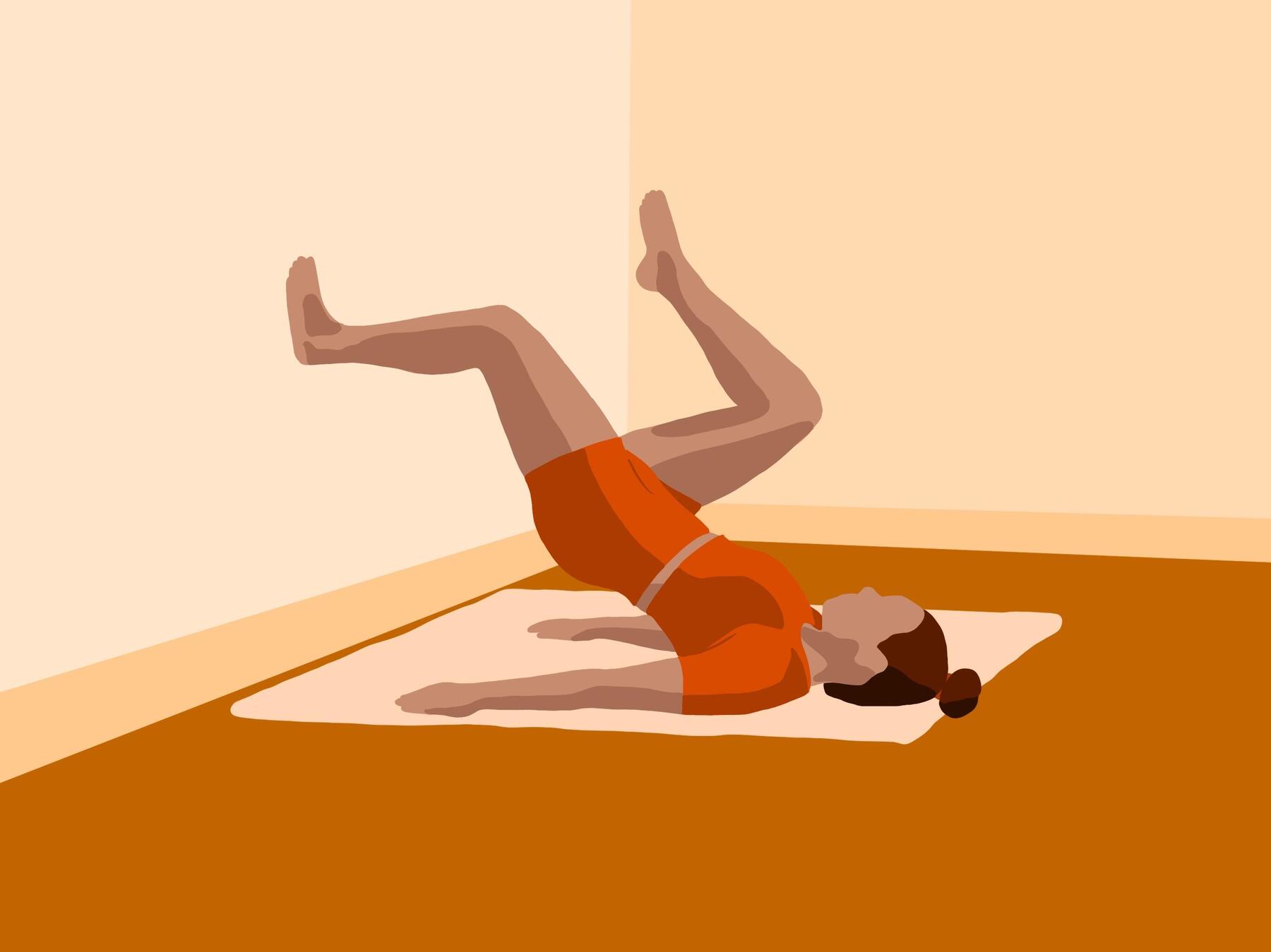 Kobieta w odzieży sportowej ćwicząca pilates przy ścianie
