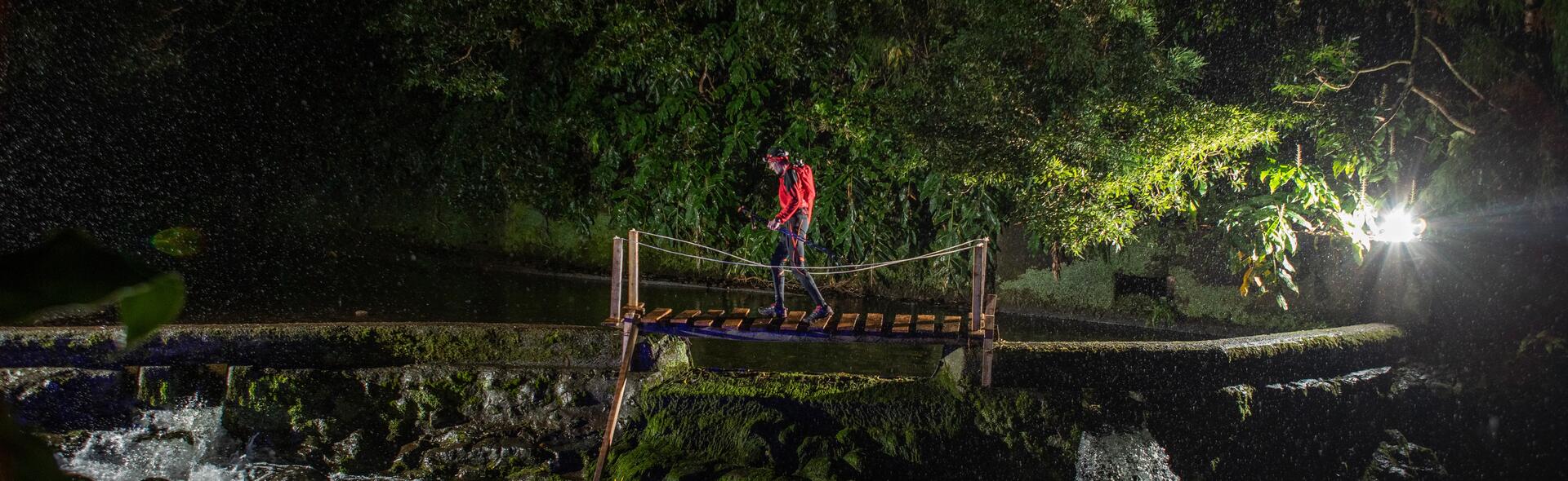 woman and man running at night 