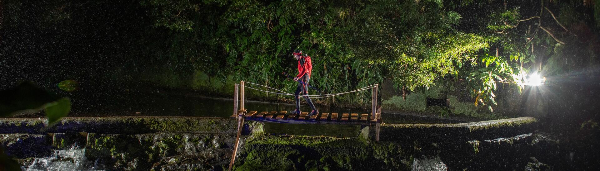 woman and man running at night 
