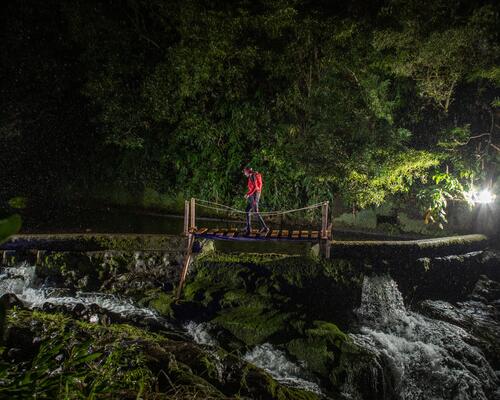 woman and man running at night 