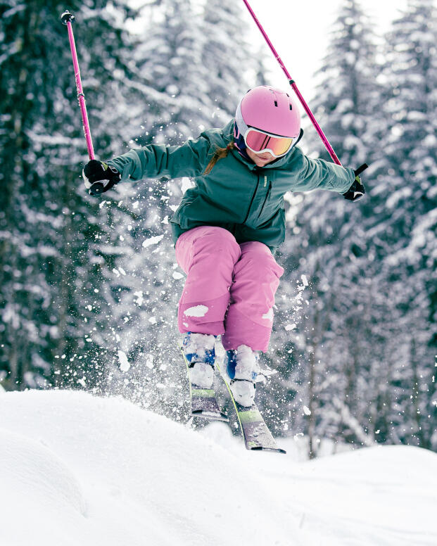 Image of woman skiing in mountain 