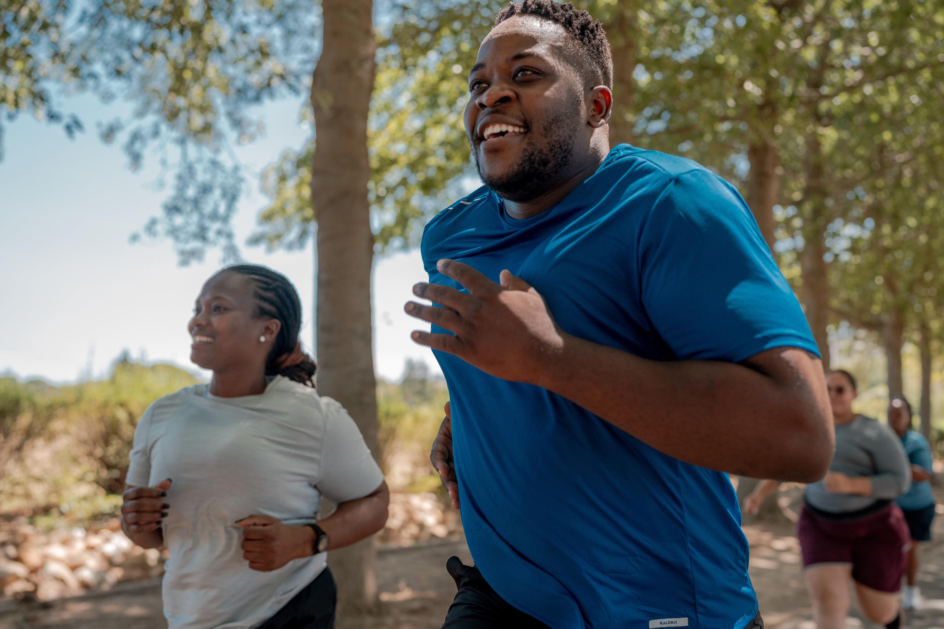 A man and a woman running in the park