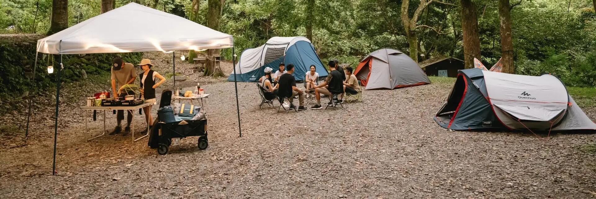 Family in tent during the night