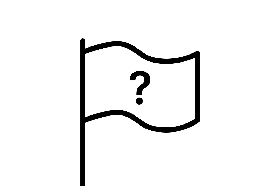 Wat betekent de vraagtekenvlag op het strand?