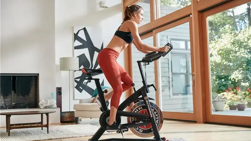 Woman on a home trainer