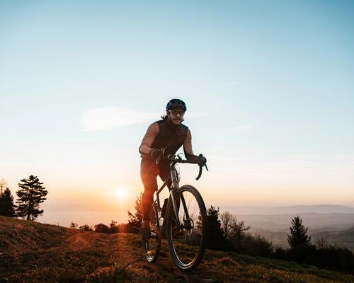 man wearing a rockrider mountain bike helmet