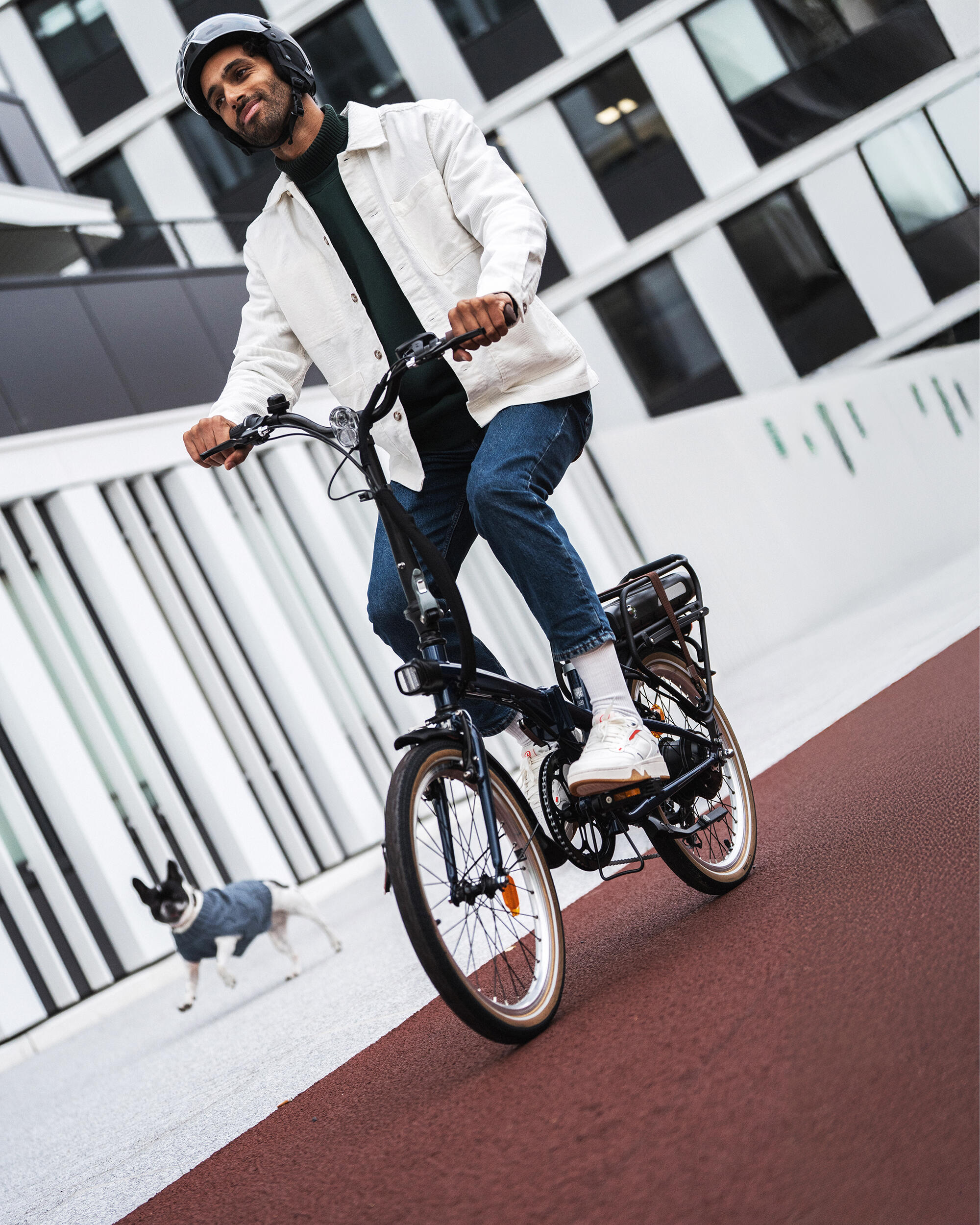 a man cycling on a foldable bike