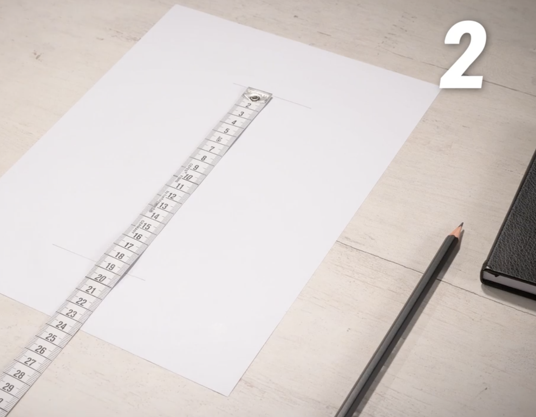 Measure the length of the hand with a ruler.