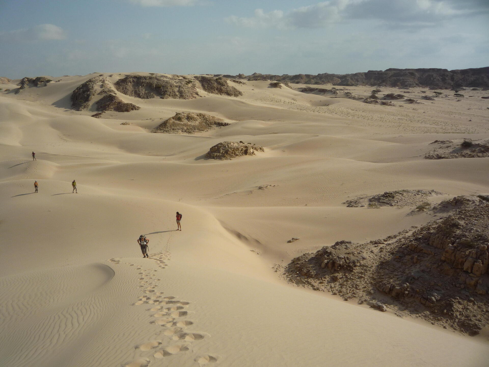 walking in the wahiba desert in oman
