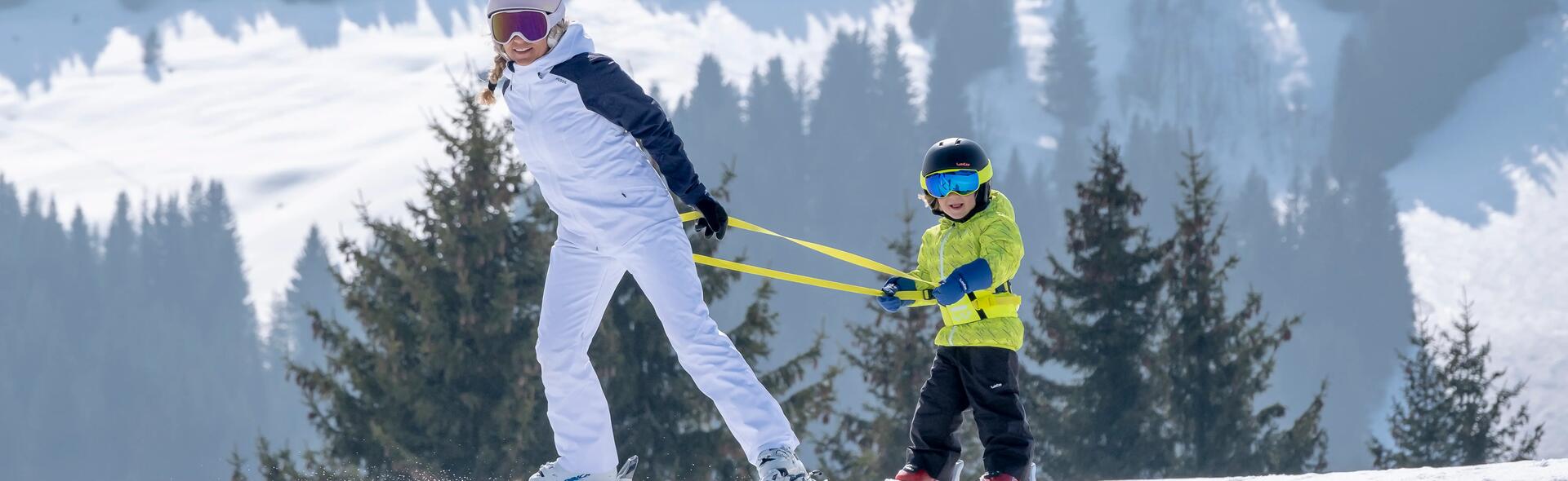 How do you use the children's ski initiation harness? 