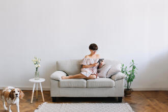 woman relaxing on her couch